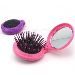 Mirror with comb
