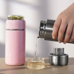 Stainless steel cup with separation of tea and water